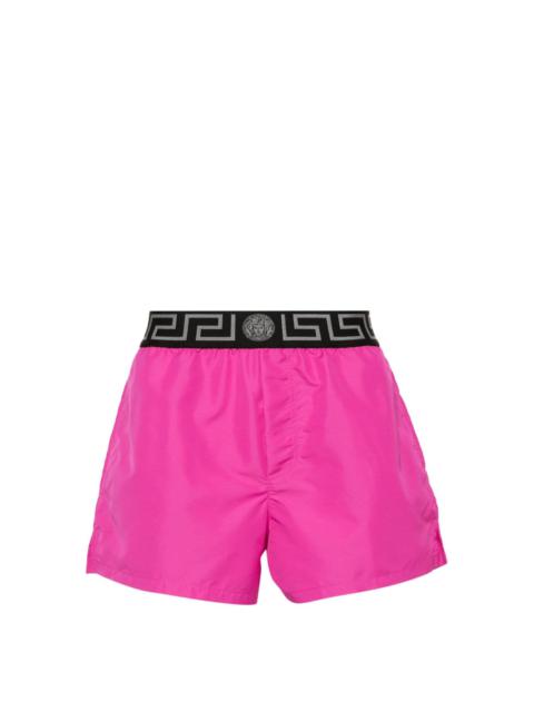 VERSACE Greca logo-waistband swim shorts