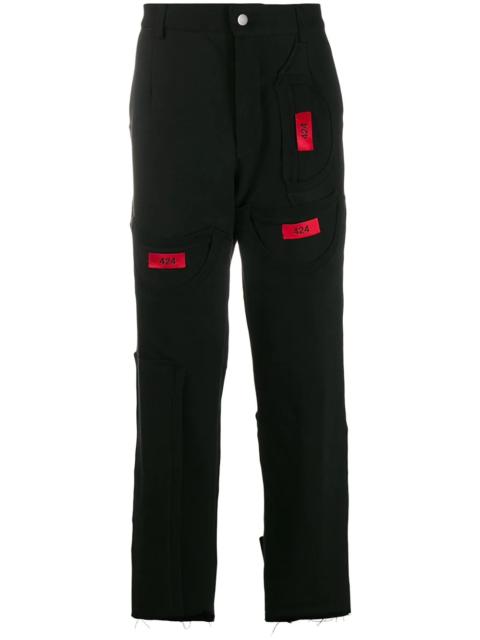 424 contrasting patch logo trousers