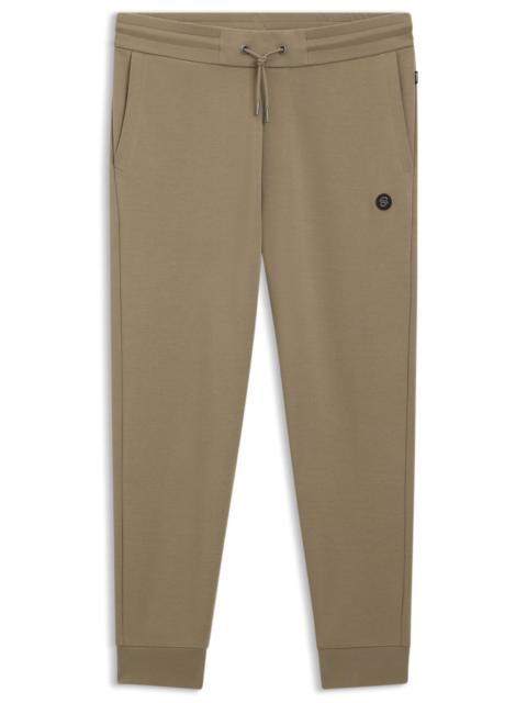 COTTON-BLEND TRACKSUIT BOTTOMS WITH METALLIC DOUBLE B MONOGRAM