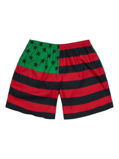 DENIM TEARS Denim Tears Flag Swim Trunks 'Red Black Green' SS26BSW13832377