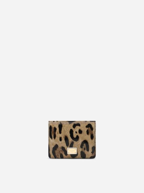 Polished calfskin wallet with leopard print