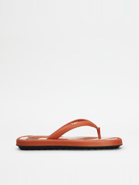 Tod's THONGS IN LEATHER - ORANGE