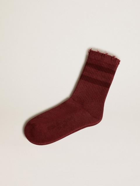 Burgundy socks with distressed details and tone-on-tone stripes