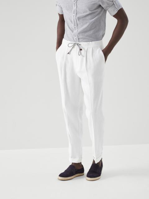 Twisted linen leisure fit trousers with double pleats and drawstring