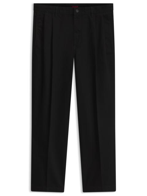 HUGO RELAXED-FIT JEANS IN BLACK RIGID DENIM WITH TAILORING-INSPIRED DETAILS