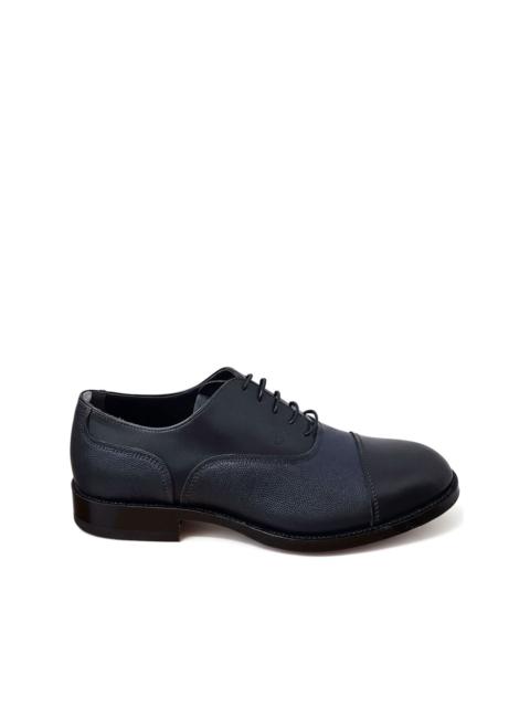 Tod's cap-toe leather Oxford shoes