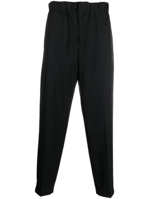 elasticated-waistband tapered trousers