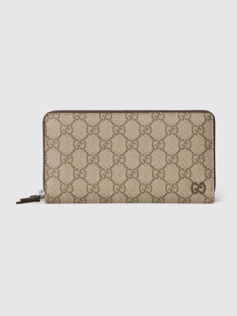 GUCCI Brown interior GG zip around wallet