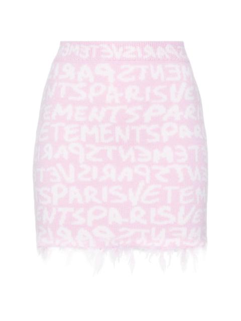 VETEMENTS monogram-jacquard merino miniskirt