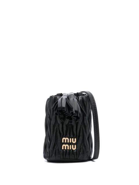 Miu Miu logo-lettering matelassé mini bag