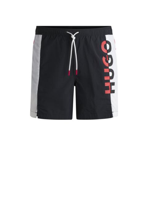 HUGO COLOR-BLOCKED SWIM SHORTS WITH TWO-TONE LOGO