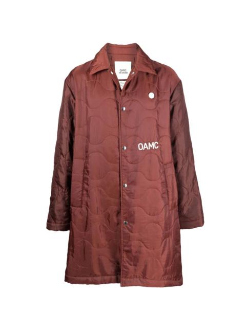 OAMC quilted logo-print coat