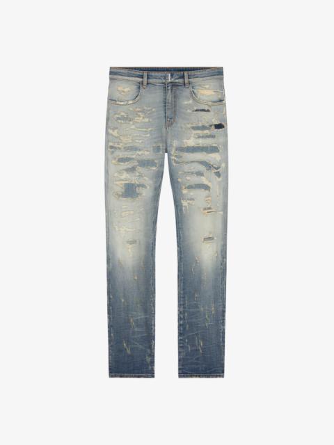 JEANS IN RIP AND REPAIR DENIM