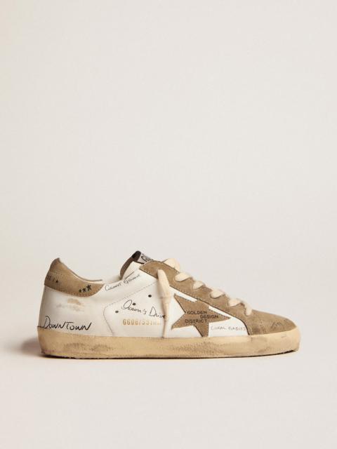 Golden Goose Super-Star sneakers in white leather with dove-gray suede inserts and all-over black lettering