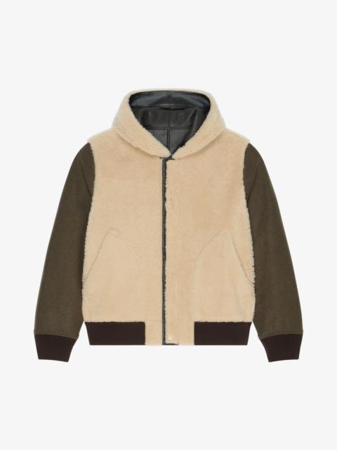 REVERSIBLE VARSITY JACKET IN LEATHER AND SHEARLING