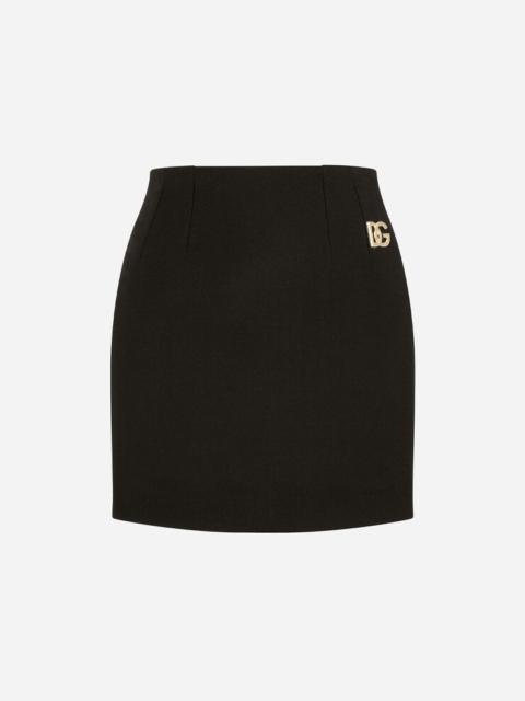 Double crepe miniskirt with DG embellishment