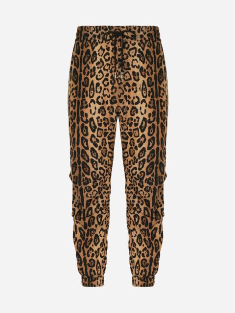 Dolce & Gabbana Jogging pants with leopard-print Crespo and tag