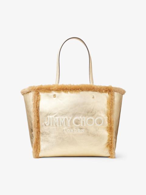 JIMMY CHOO Avenue Tote Bag
Gold Metallic Nappa and Shearling Tote Bag with Jimmy Choo Embroidery