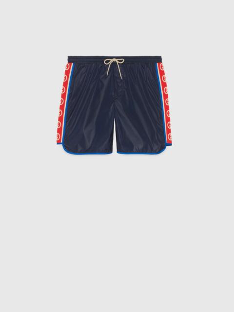 GUCCI Nylon swim shorts with logo stripe