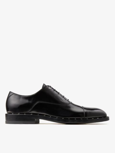 JIMMY CHOO Finnion
Black Brush-Off Leather Oxford Shoes with Star Studs