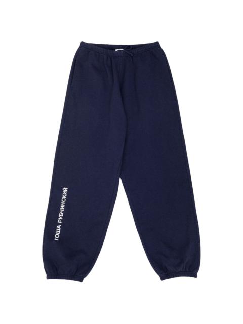 Gosha Rubchinskiy logo-print cuffed track pants