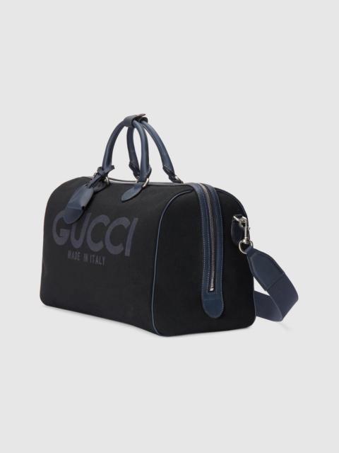 GUCCI Large duffle bag with Gucci print