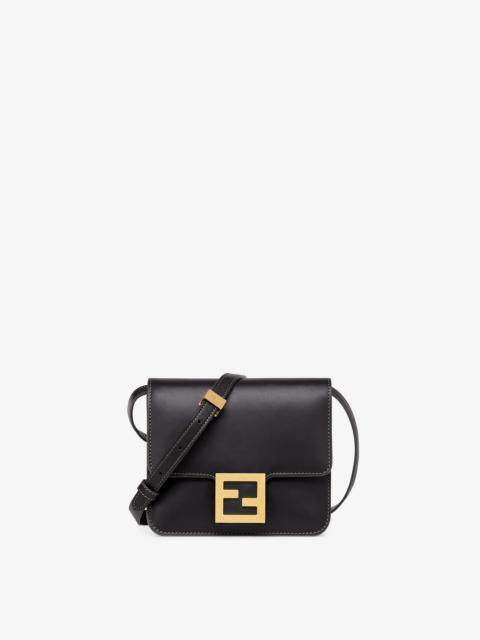 FENDI Fendi Fab bag made of black leather decorated with a geometric-shaped FF magnetic clasp. Featuring a