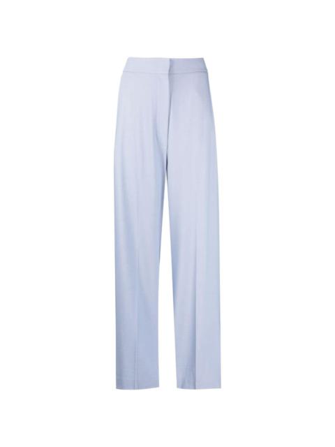 KHAITE high-waisted wide-leg trousers