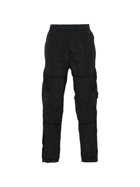 Compass-badge crinkled track pants