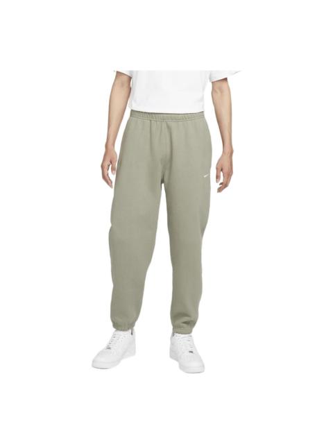 Nike Men's Nike Solo Swoosh Elastic Waistband Solid Color Bundle Feet Fleece Sports Pants/Trousers/Jogger