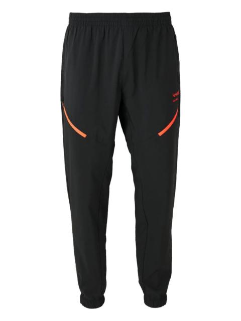 New Balance Reimagined Woven track pants