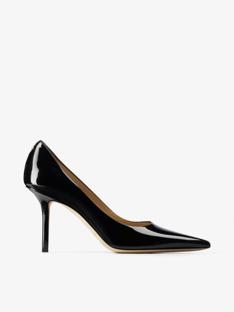 Love 85
Black Patent Leather Pumps with JC Emblem