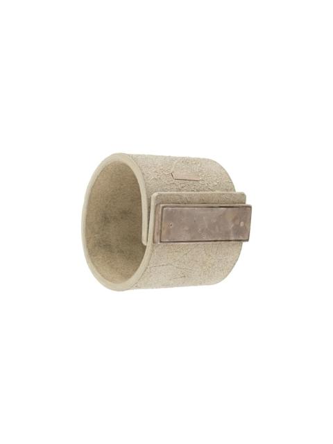 Parts of Four long-plaque cuff