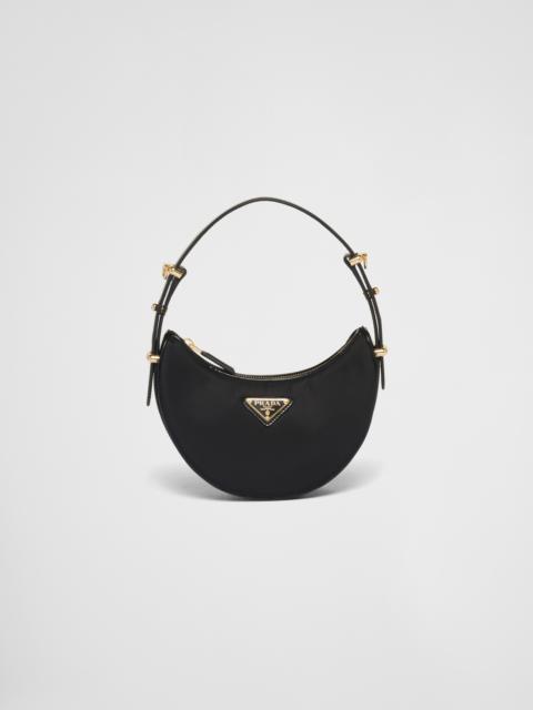 PRADA A black shoulder bag with a small coin purse