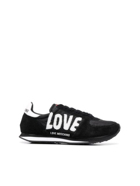 Moschino logo low-top sneakers