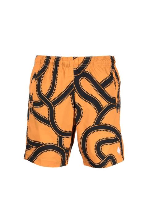 snake-print Cross-embroidered swim shorts