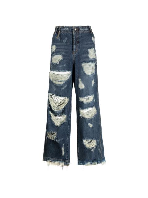 distressed-effect cotton jeans