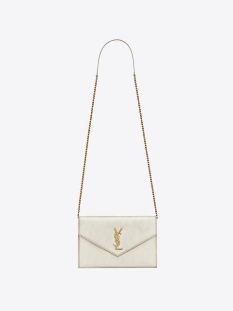 SAINT LAURENT cassandre saint laurent envelope chain wallet in metallized leather