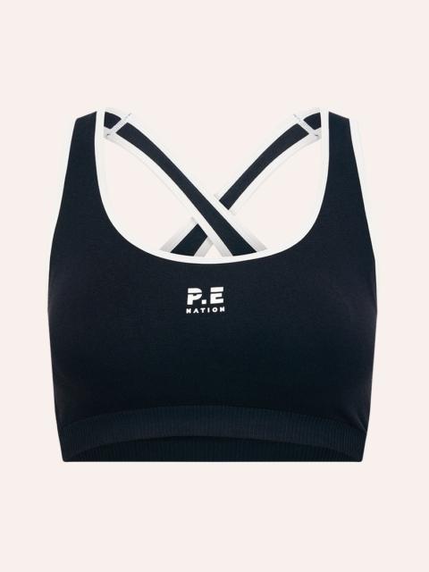 P.E NATION ADAPTION SEAMLESS SPORTS BRA IN BLACK & OPTIC WHITE