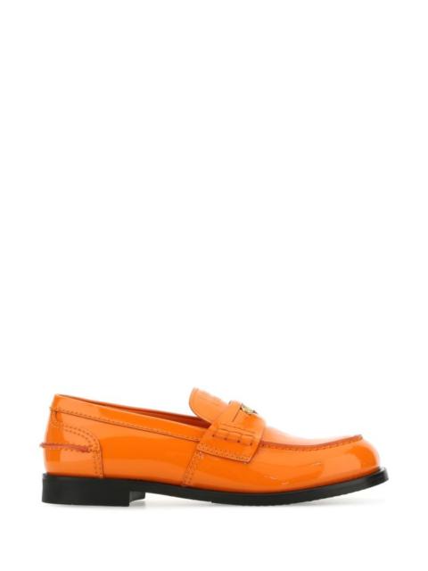 Orange leather loafers