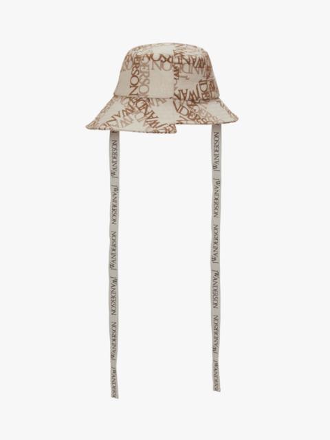 JW Anderson ASYMMETRIC BUCKET HAT WITH LOGO GRID