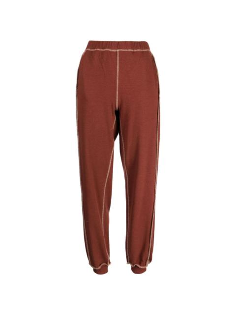 BASERANGE exposed-seam fine-ribbed track pants