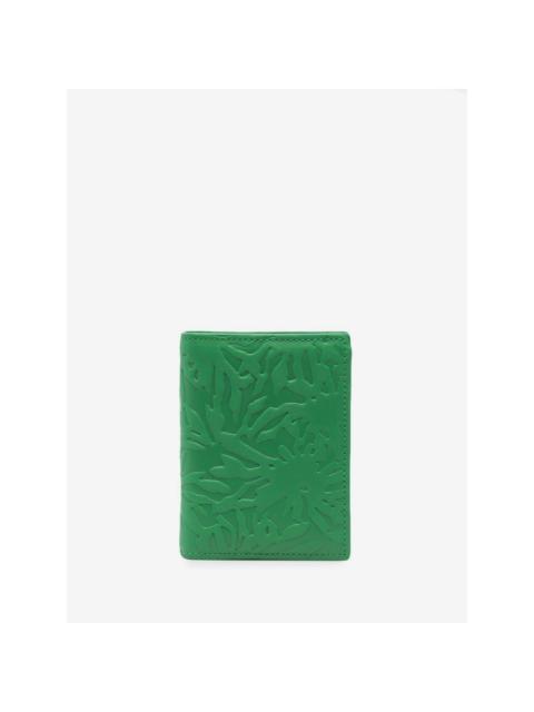 Comme Des Garçons embossed leather wallet