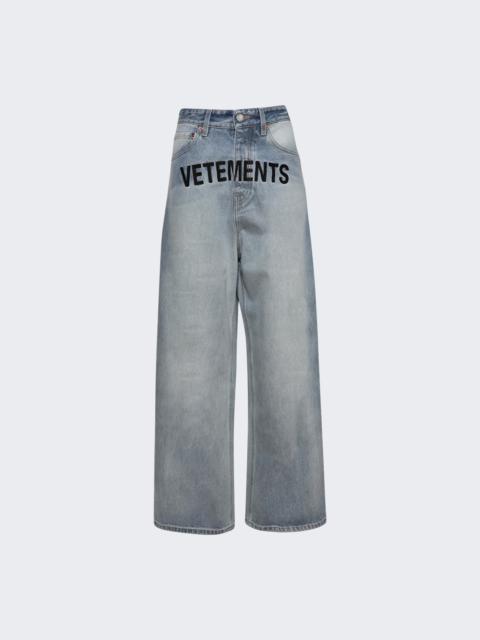 VETEMENTS Transformer logo-print jeans | REVERSIBLE