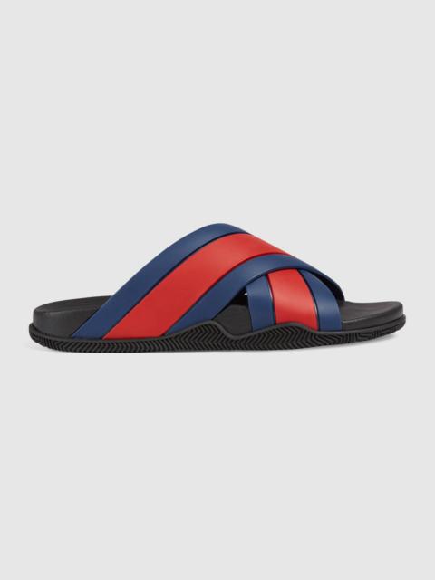 GUCCI Men's rubber slide sandal with Web | REVERSIBLE