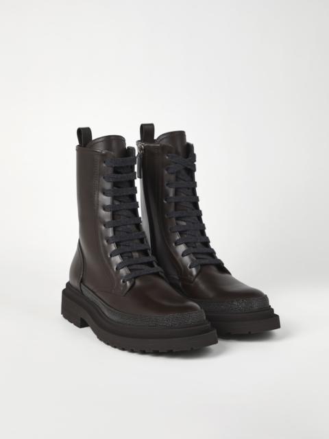 Matte calfskin boots with precious contour
