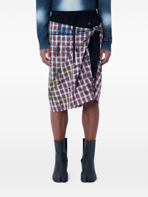 asymmetrical wrap check-print skirt