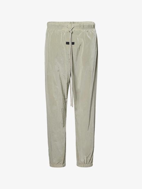 ESSENTIALS relaxed-fit woven jogging bottoms