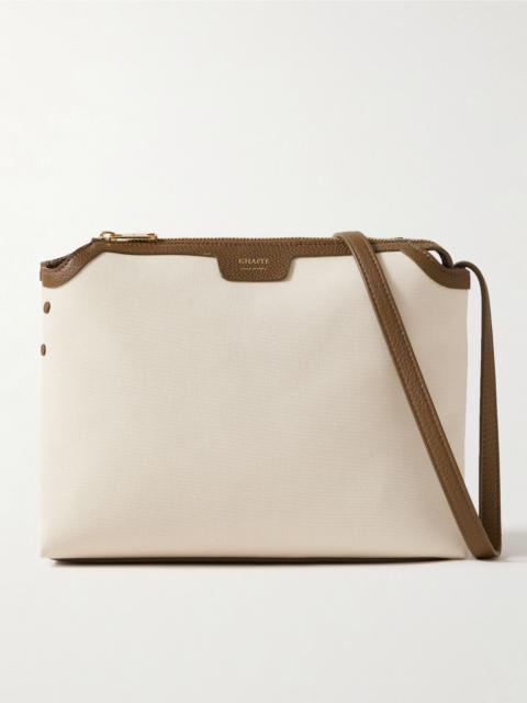 KHAITE Lina medium textured leather-trimmed canvas shoulder bag Cream