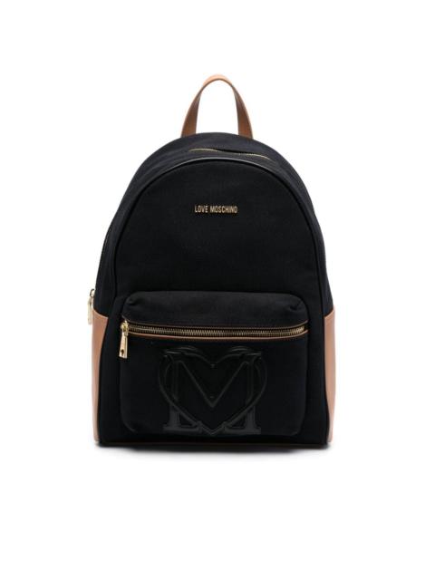 Moschino logo-appliqué textured backpack